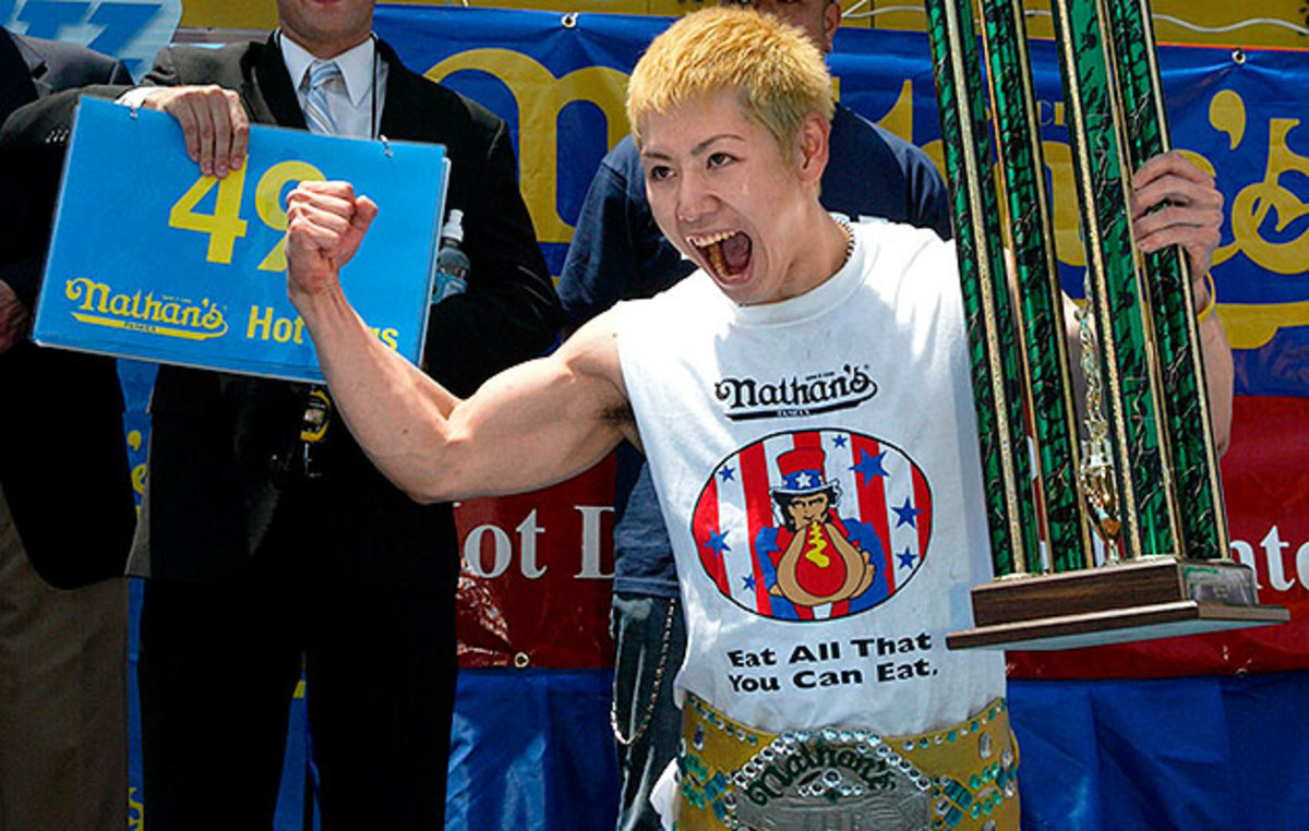 Kobayashi’s winning hot dog totals: 50 in 2001, 50 1/2 in 2002, 44 1/2 in 2003, 53 1/2 in 2004, 49 in 2005, 53 3/4 in 2006.