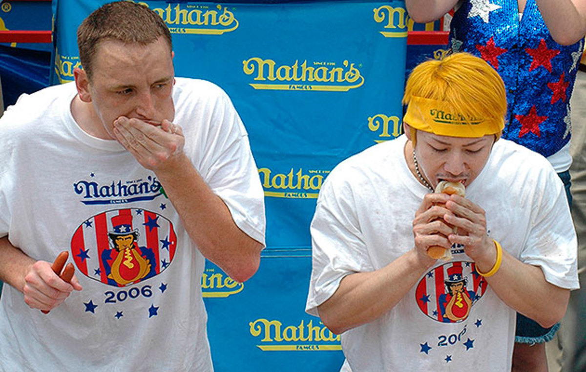 One year after Chestnut (left) set the U.S. record with a second-place finish in 2006, he beat Kobayashi for the first time—then won the next seven titles.