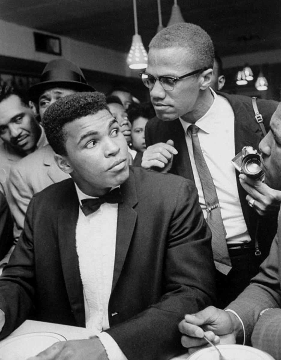 140224180211-1964-0302-muhammad-ali-cassius-clay-malcolm-x-001329804-single-image-cut.jpg