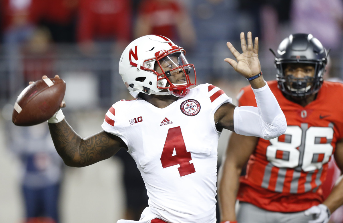 Nebraska QB Armstrong carted off heads slams on ground Sports Illustrated