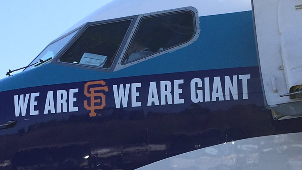 A’s fly in an airplane with a San Francisco Giants logo on it Sports Illustrated