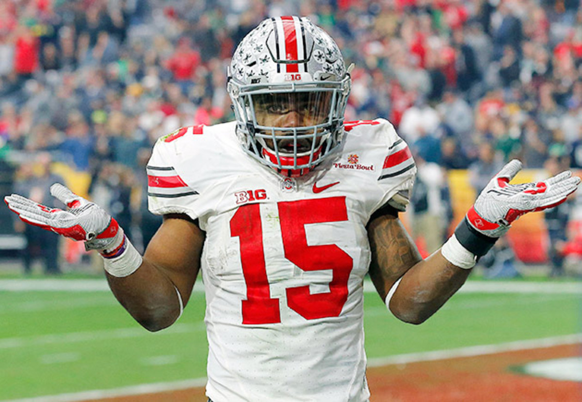ezekiel-elliott-joey-bosa-shrug-ohio-state-notre-dame-fiesta-bowl.jpg
