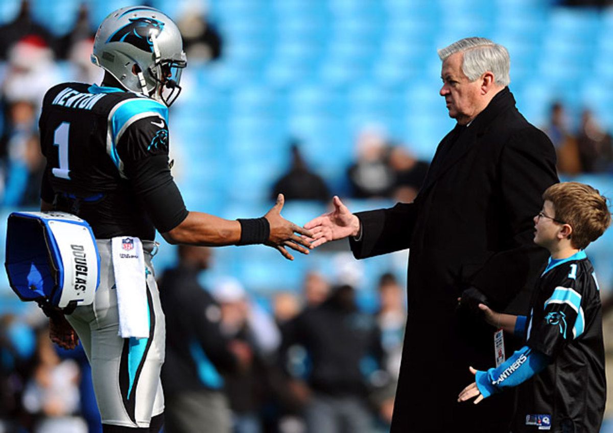 Jerry Richardson with his quarterback, Cam Newton.