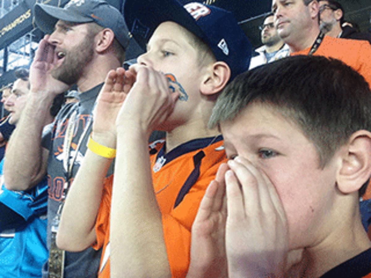 Derek, Bryce and Cole Johnson cheer for the Broncos at the Super Bowl. 