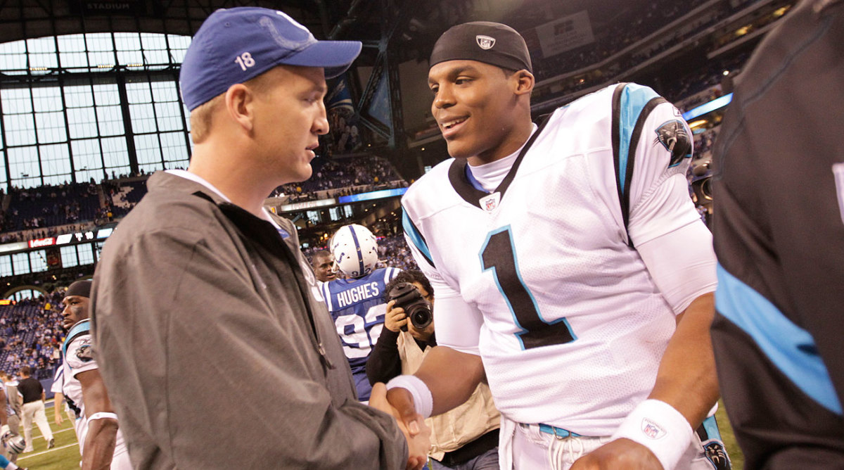 Peyton Manning and Cam Newton shook hands after a Nov. 2011 Panthers-Colts game in Indianapolis.