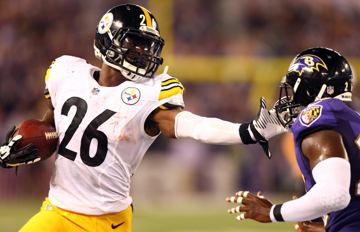 Le’veon Bell stiff-arms Matt Elam, September 2014.