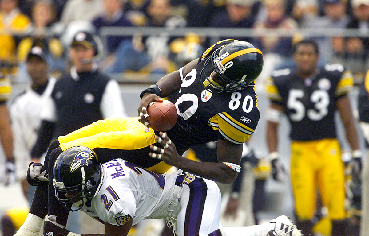 Chris McAllister cuts down Plaxico Burress in 2001. 