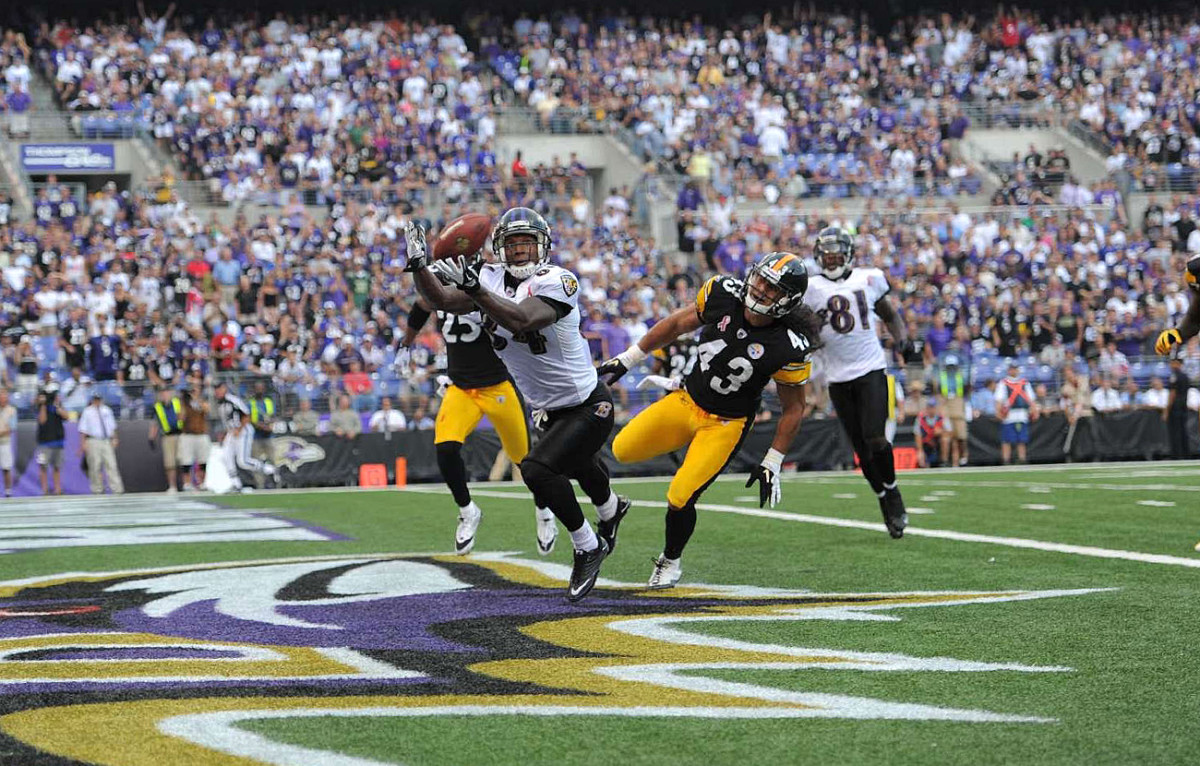 Ed Dickson catches a TD pass, September 2011.