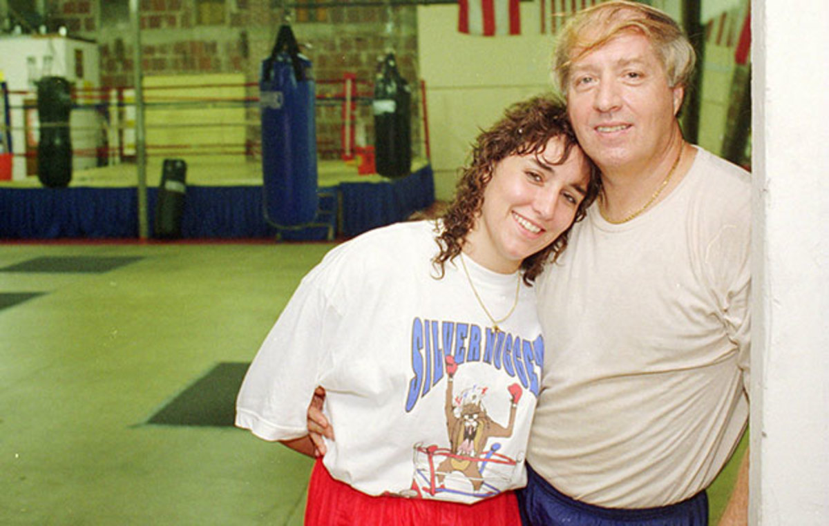 Christy and Jim Martin pose at their gym in Orlando in 1995.