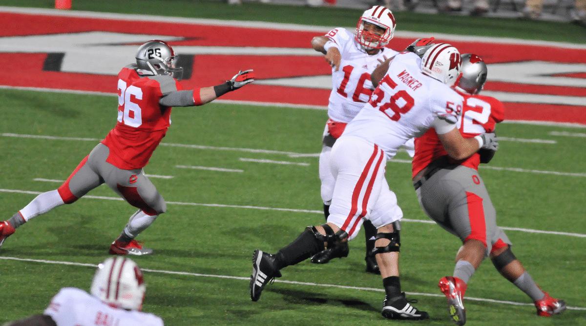 Rick Wagner protects Wilson during a game at Ohio State. 