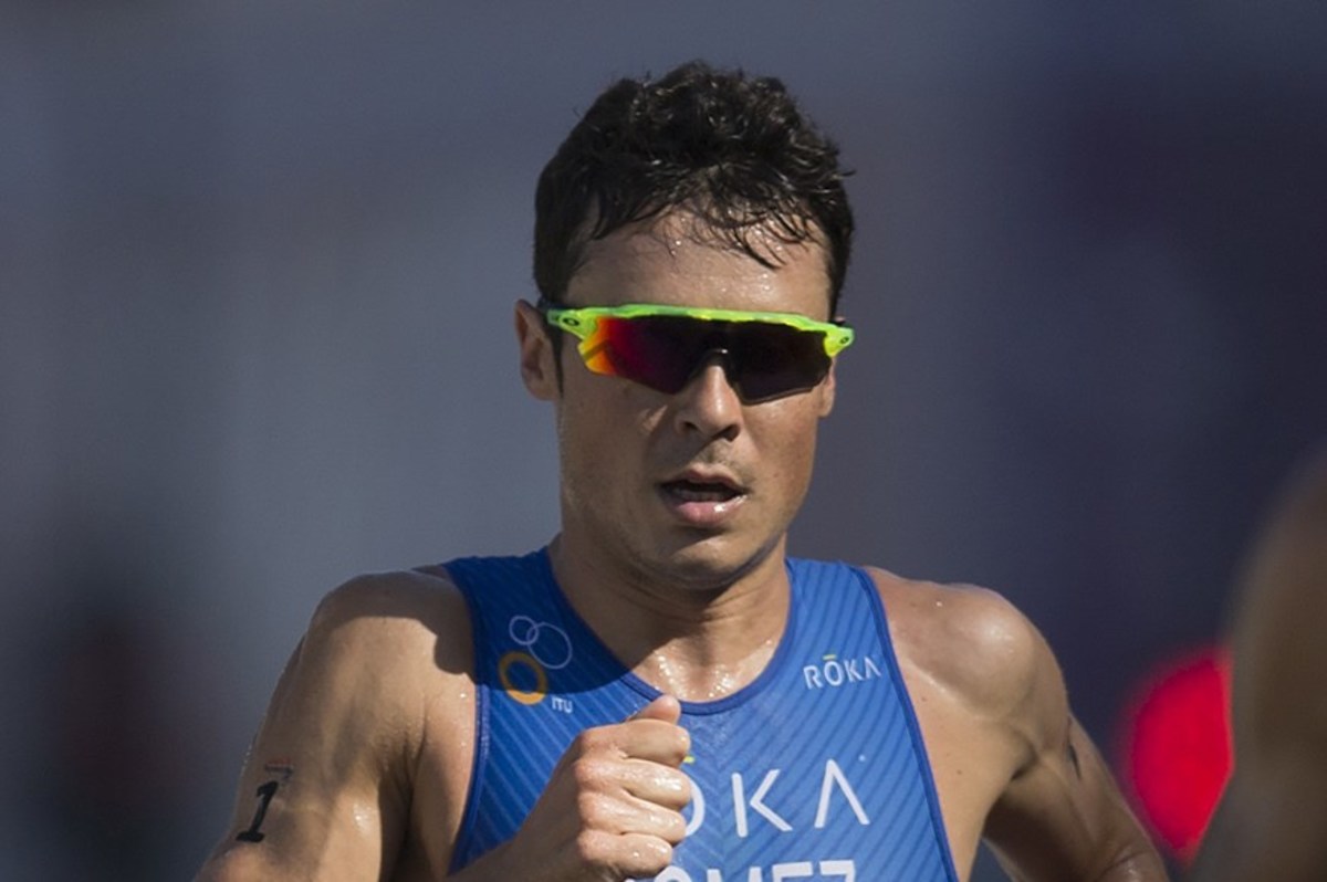 FILE In this Aug. 2, 2015 file picture Javier Gomez Noya, of Spain, competes during the men's triathlon ITU World Olympic Qualification Event , in Rio de Janeiro, Brazil. Spanish triathlete Javier Gomez has been awarded Spain's highest sports honor afte