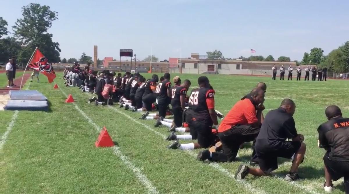 Woodrow Wilson high school football team kneels for anthem Sports