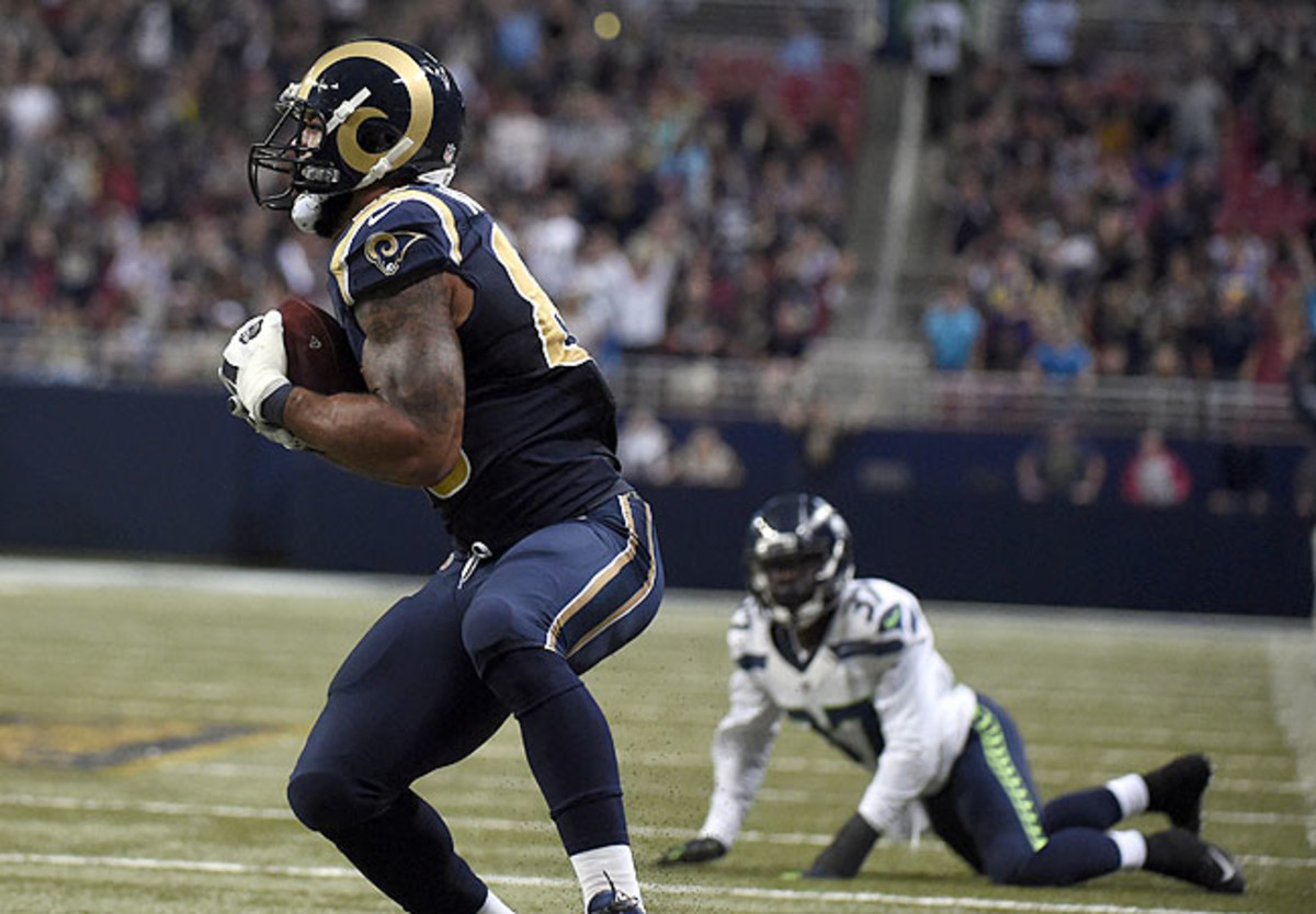 Dion Bailey could only watch as Rams tight end Lance Kendricks scored the game-tying TD. (L.G. Patterson/AP)