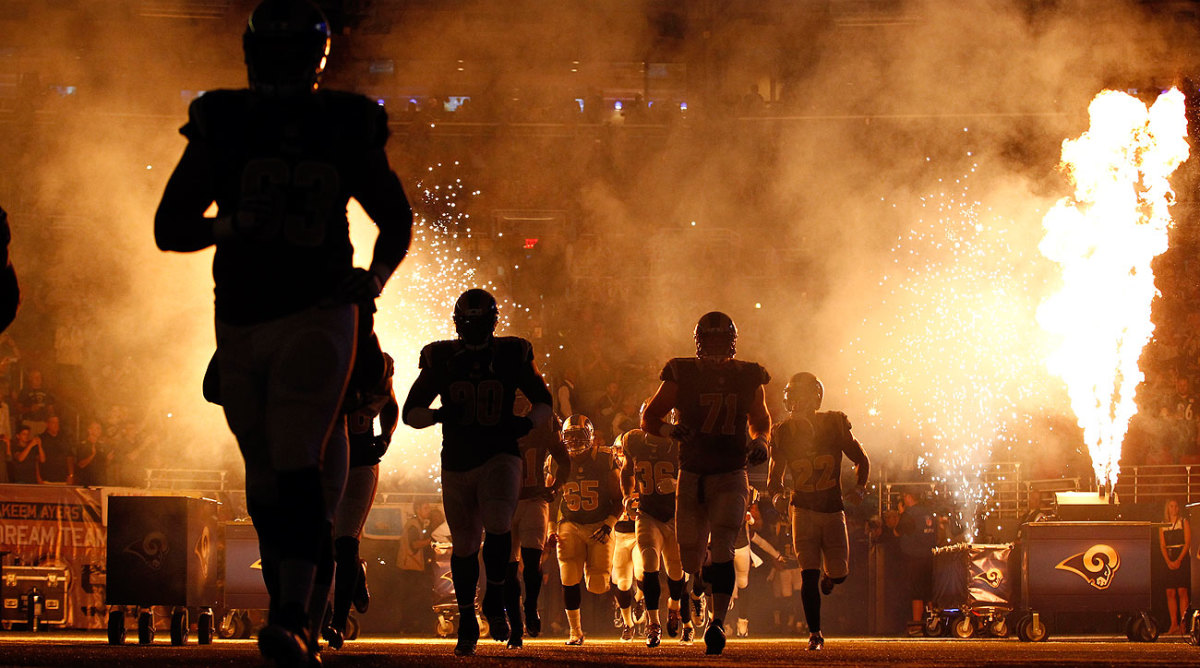 The Steelers-Rams game was delayed nearly 30 minutes due to a fire scorching the turf during a pre-game ceremony. (Billy Hurst/AP)