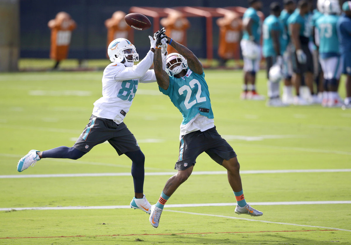 Miami-Dolphins-Jamar-Taylor-Greg-Jennings.jpg