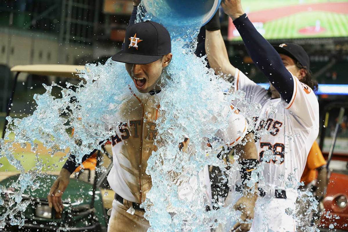 2015-0819-Carlos-Correa-doused-by-Colby-Rasmus.jpg