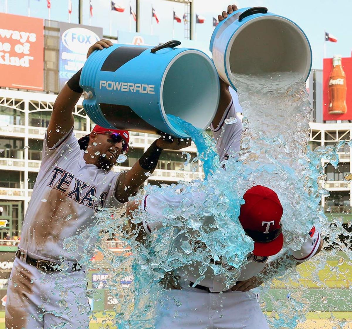 2015-0816-Ryan-Strausborger-doused-by-Rougned-Odor-Elvis-Andrus.jpg