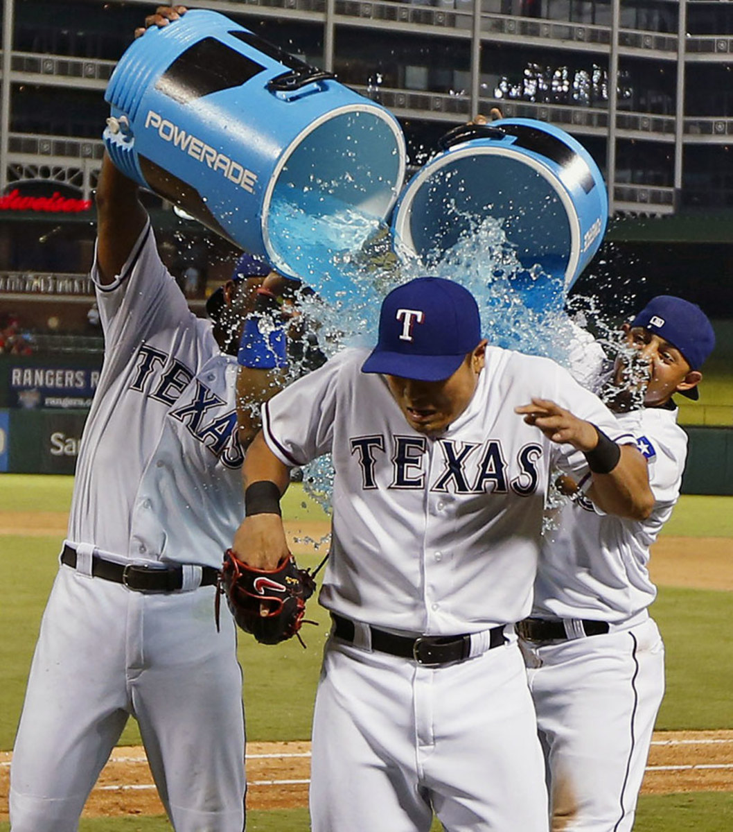 2015-0815-Shin-Soo-Choo-doused-by-Elvis-Andrus-Rougned-Odor.jpg