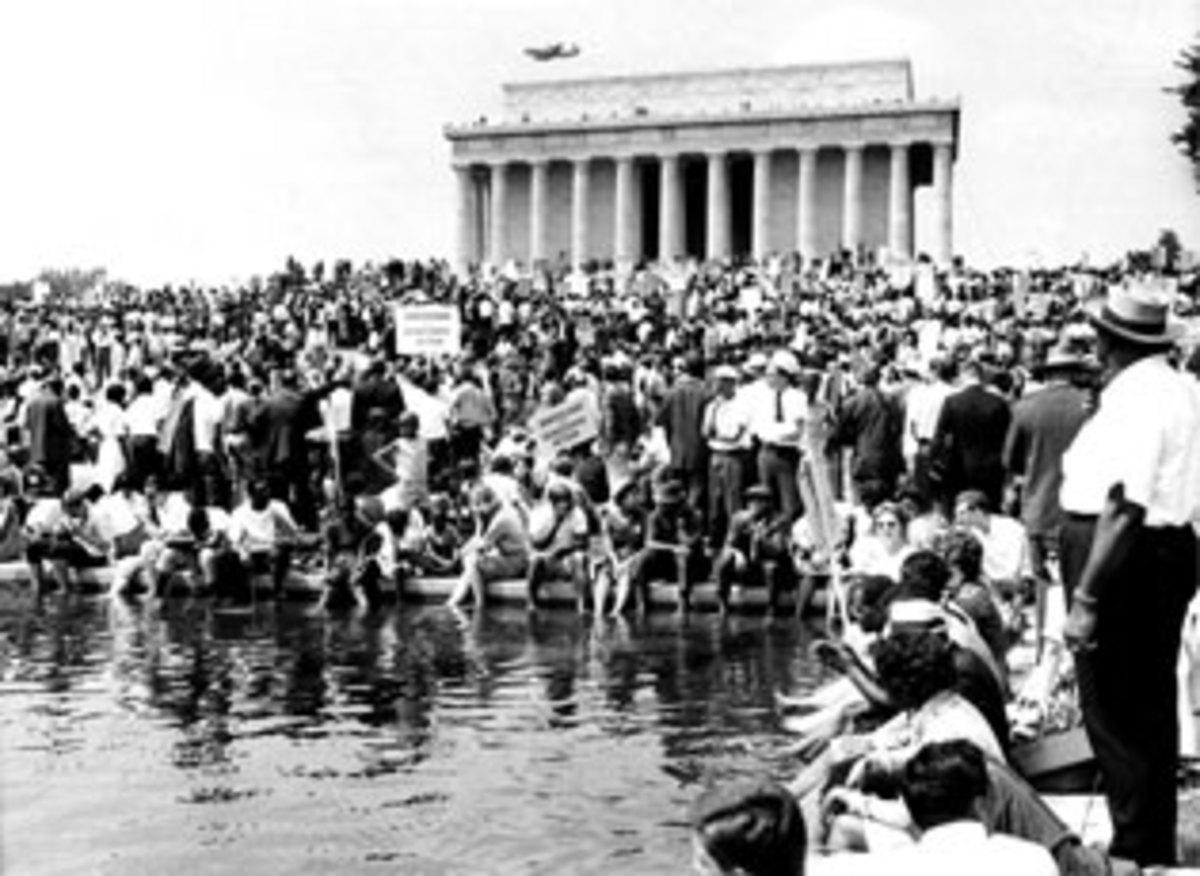 Many in the crowd at the Lincoln Memorial cooled off by dipping their feet in the Reflecting Pool.