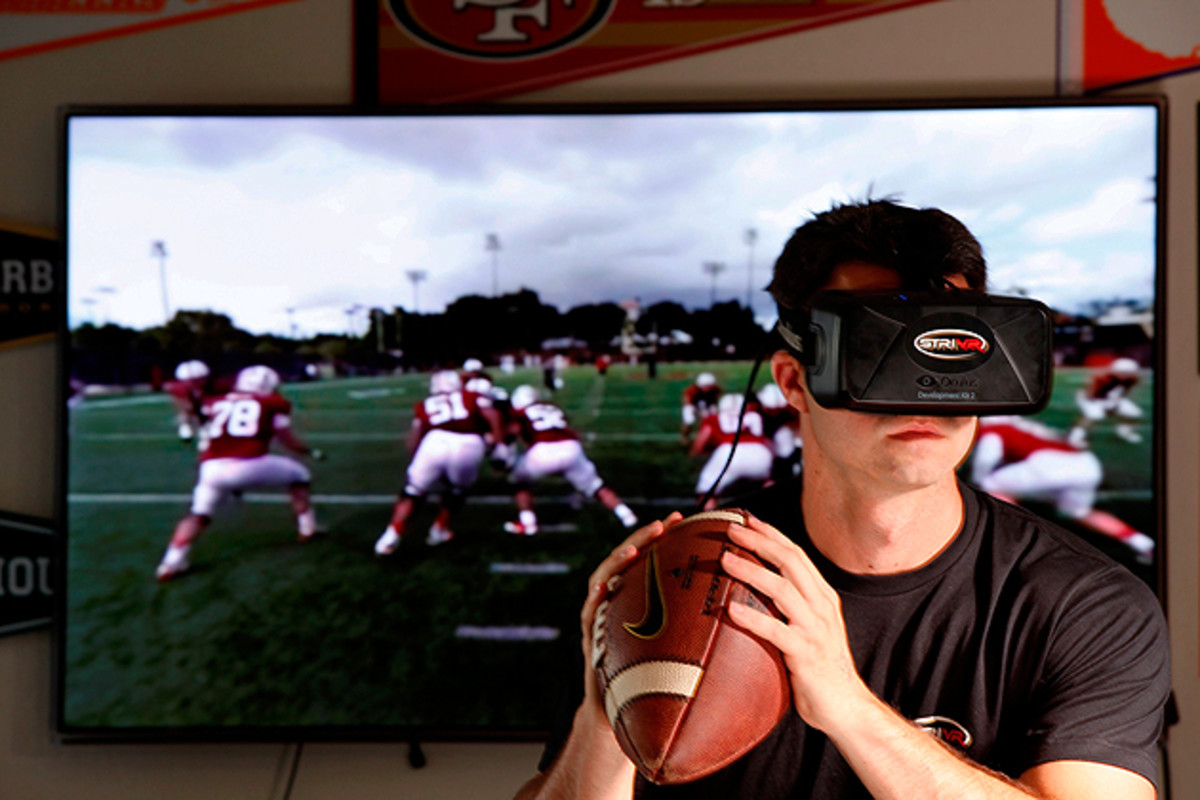 Screen Time: The STRIVR system, demonstrated here by Derek Belch's brother Danny, was specifically designed to help teams train without contact. 