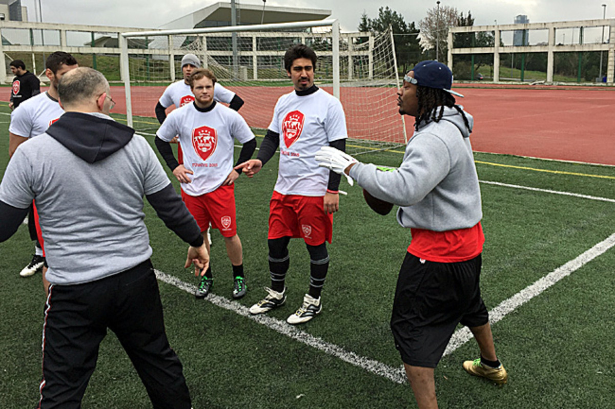 Marshawn Lynch, here teaching the finer points of quarterbacking (seriously) in Turkey, has been a supporter of Barnidge's AFWB group.