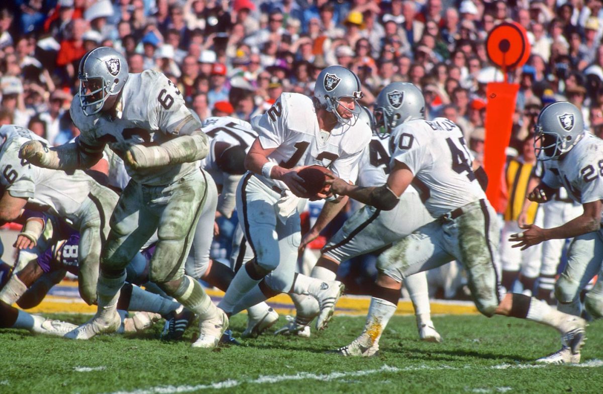 1977-palmer-XI-jan-9-Ken-Stabler-handoff-Pete-Banasza.jpg