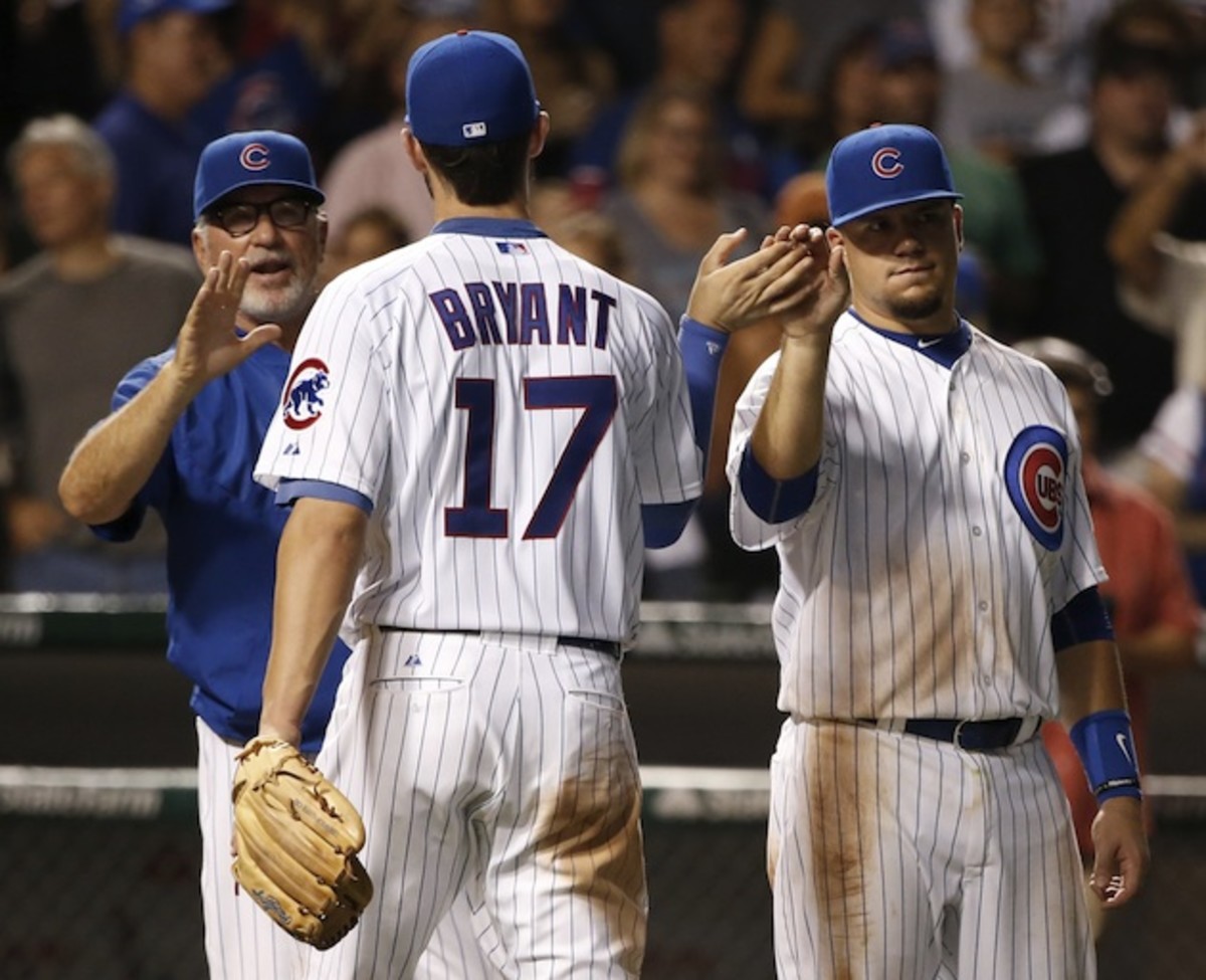 Kris Bryant (l) and Kyle Schwarber (r) have been at the vanguard of the Cubs' resurgence