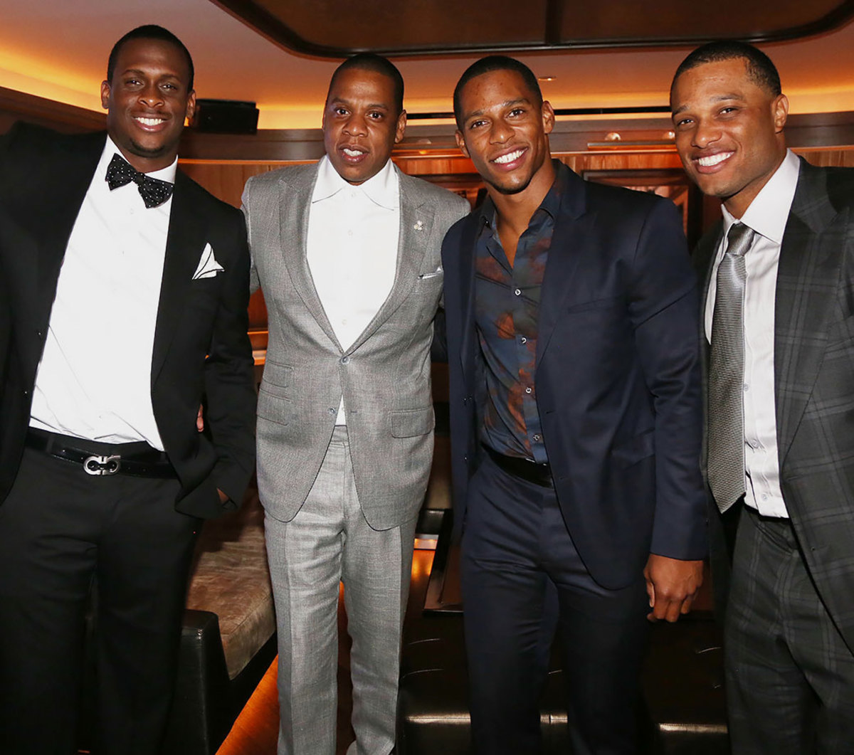 2013-0617-Geno-Smith-Jay-Z-Victor-Cruz-Robinson-Cano.jpg