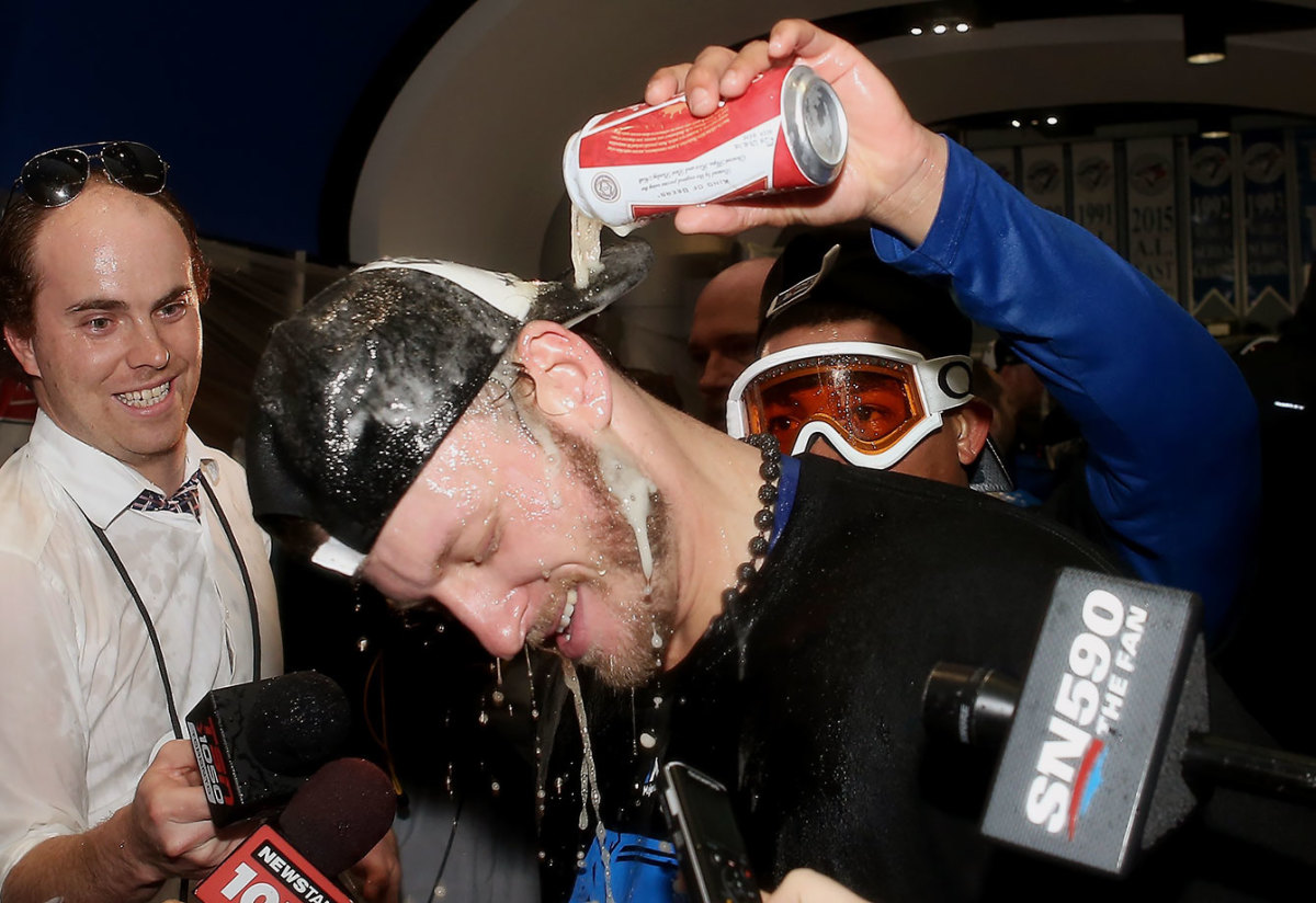 2015-1014-Toronto-Blue-Jays-celebration-Josh-Donaldson-Ben-Revere.jpg