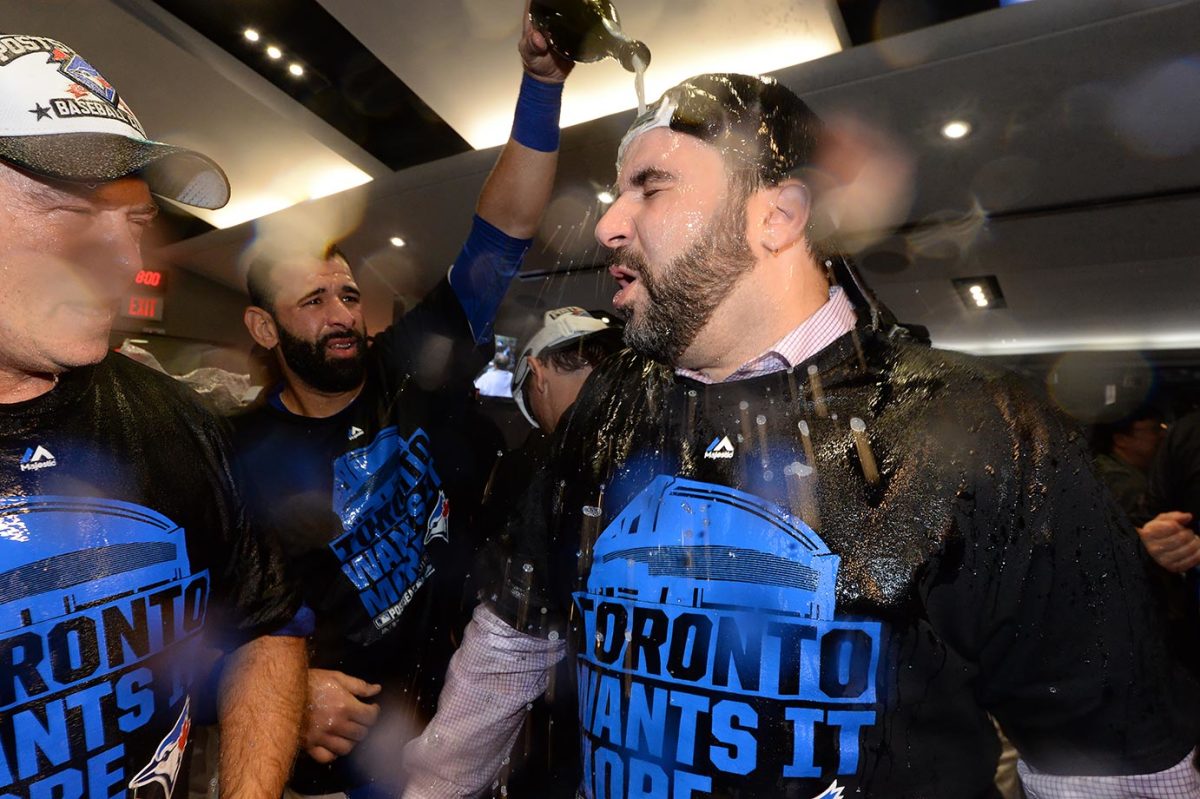 2015-1014-Toronto-Blue-Jays-celebration-Alex-Anthopoulos-Jose-Bautista.jpg