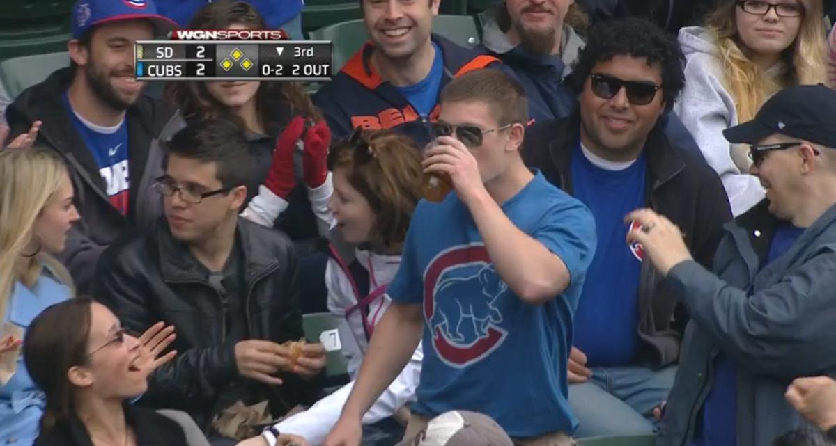 Video Chicago Cubs fan chugs beer after catching foul ball Sports