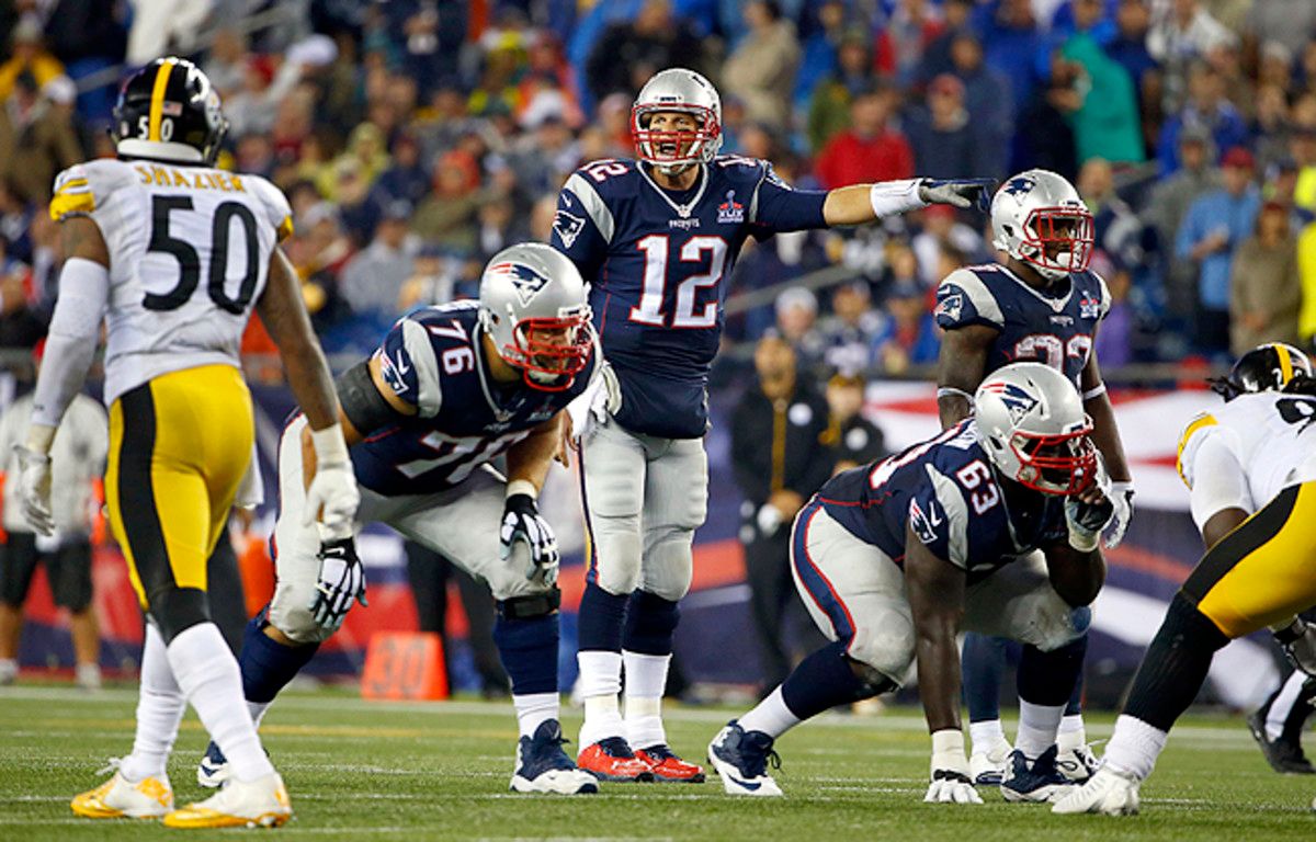 Rookie Tre' Jackson (No. 63) was one of the young interior linemen who helped keep Brady clean on Thursday night. (Winslow Townson/AP)