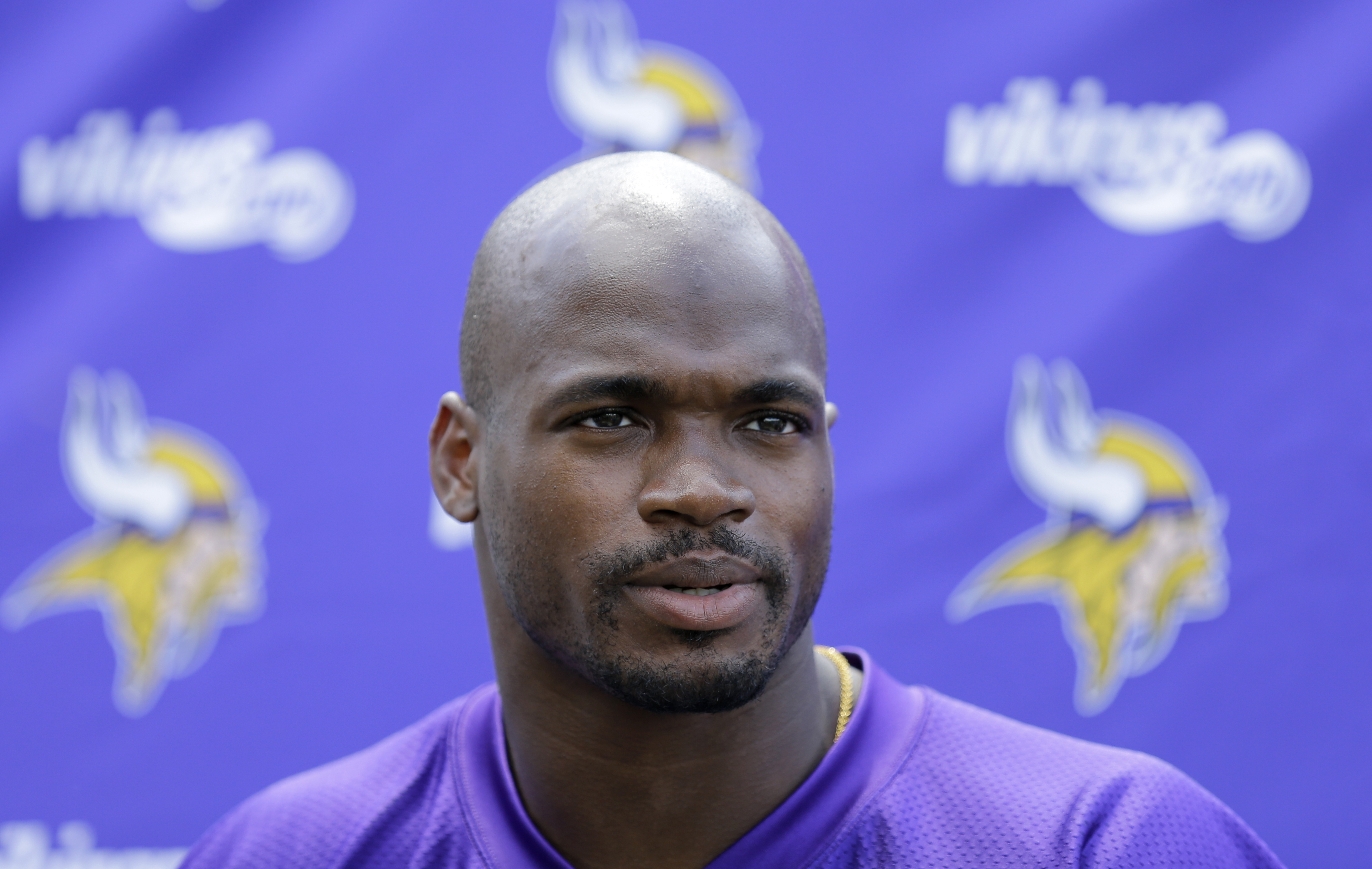 Peterson, Vikings agree to redo last 3 years of deal Sports Illustrated