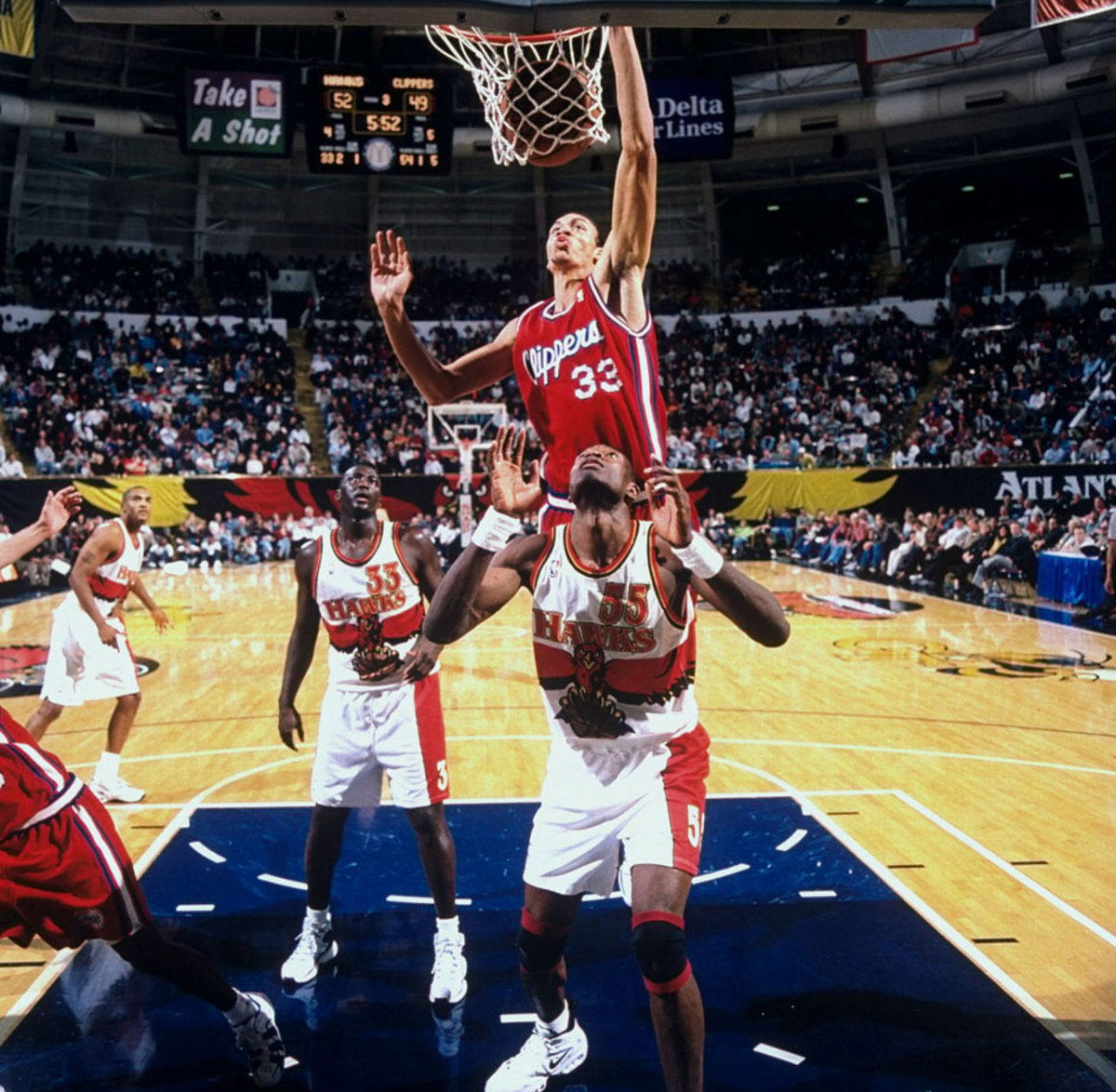 Keith-Closs-Dikembe-Mutombo-05707153.jpg