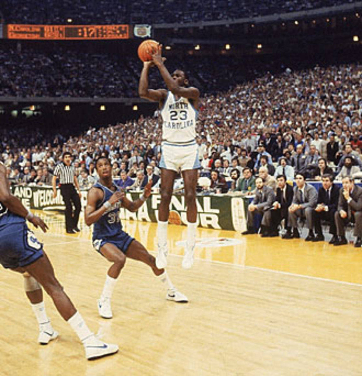 With Smith looking on, a freshman named Michael Jordan hit the shot that won the 1982 NCAA championship.