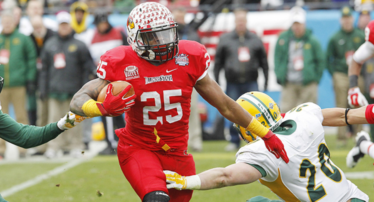 Illinois State running back Marshaun Coprich (25) carries the ball as North Dakota State safety Colten Heagle (20) tries to tackle during the FCS Championship NCAA college football game Saturday, Jan. 10, 2015, in Frisco, Texas.   North Dakota State won t