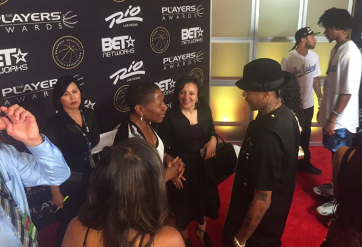Allen Iverson (right) and NBPA executive director Michele Roberts catch up before the awards.