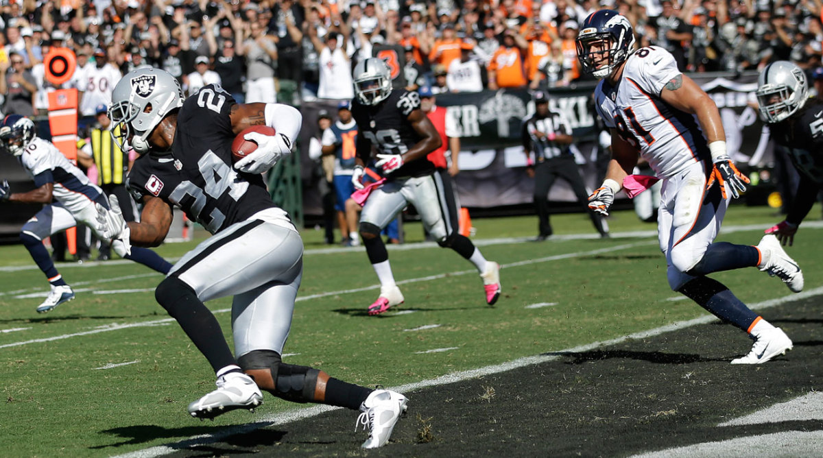 Woodson’s first career pick of Peyton thwarted a Broncos scoring drive at the end of the first half.