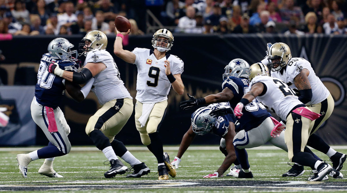 Drew Brees reached 400 touchdowns in his 205th NFL game, making him the fastest QB to hit that mark. (Jonathan Bachman/AP)