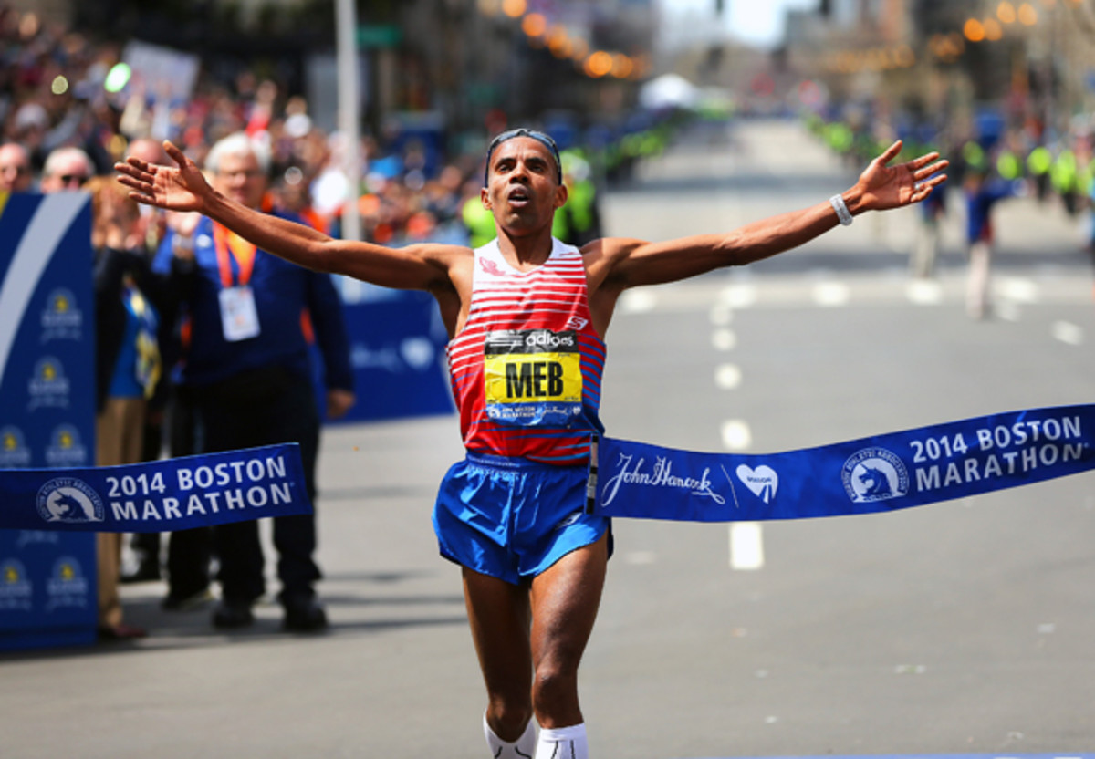 Meb crosses the finish line to win first place in the men's race of the 118th Boston Marathon.