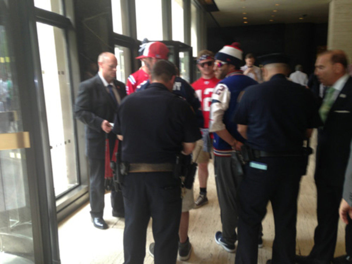 patriots-protesters-handcuffed.jpg