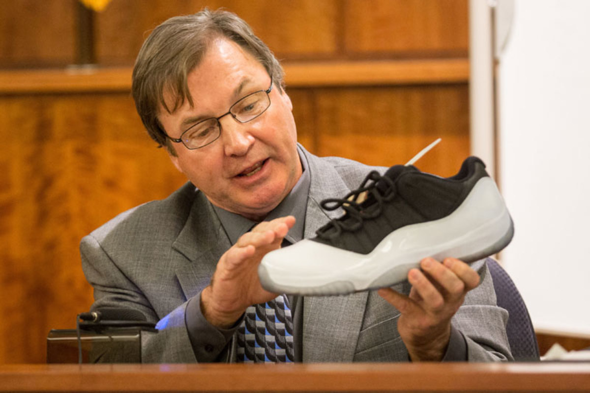 A Nike shoe expert testifies. (Aram Boghosian/Boston Globe/AP)