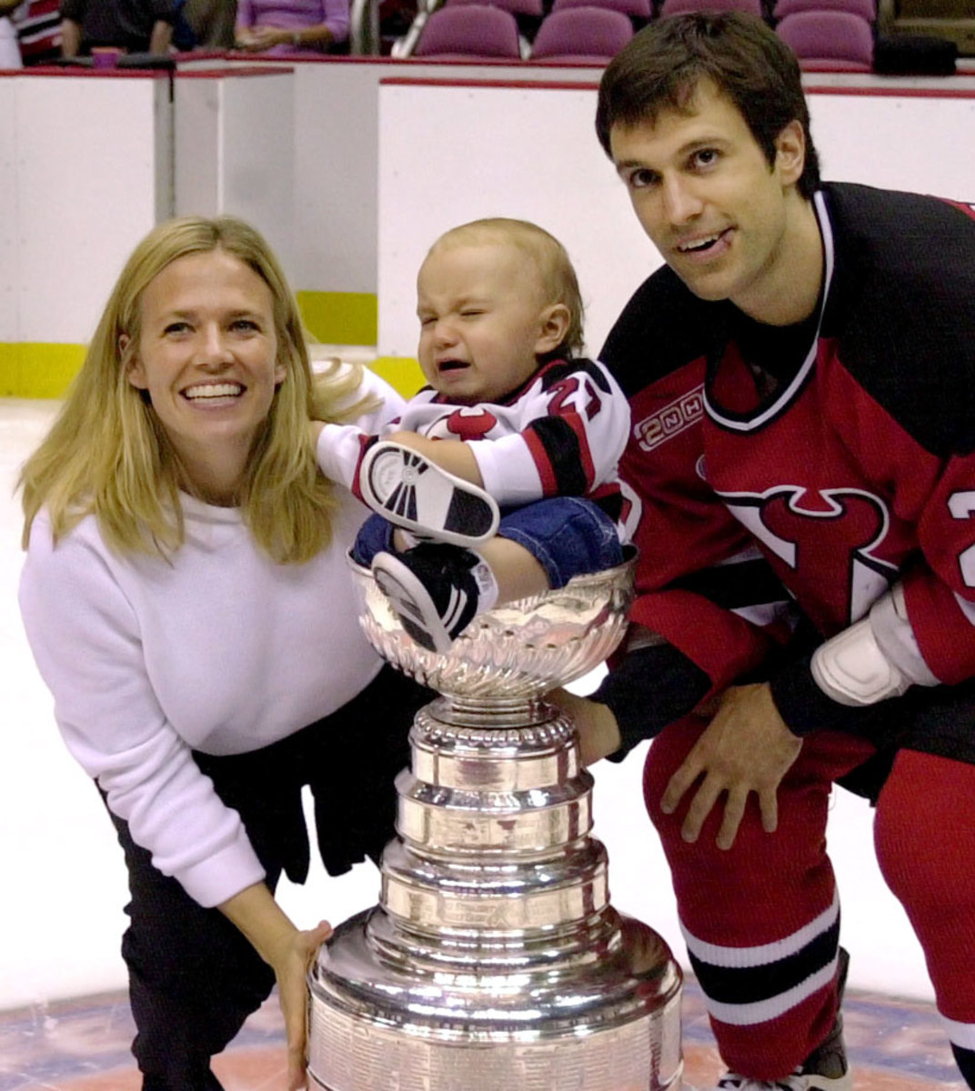 2000-Scott-Niedermayer-wife-Lisa-son-Logan-Stanley-Cup.jpg