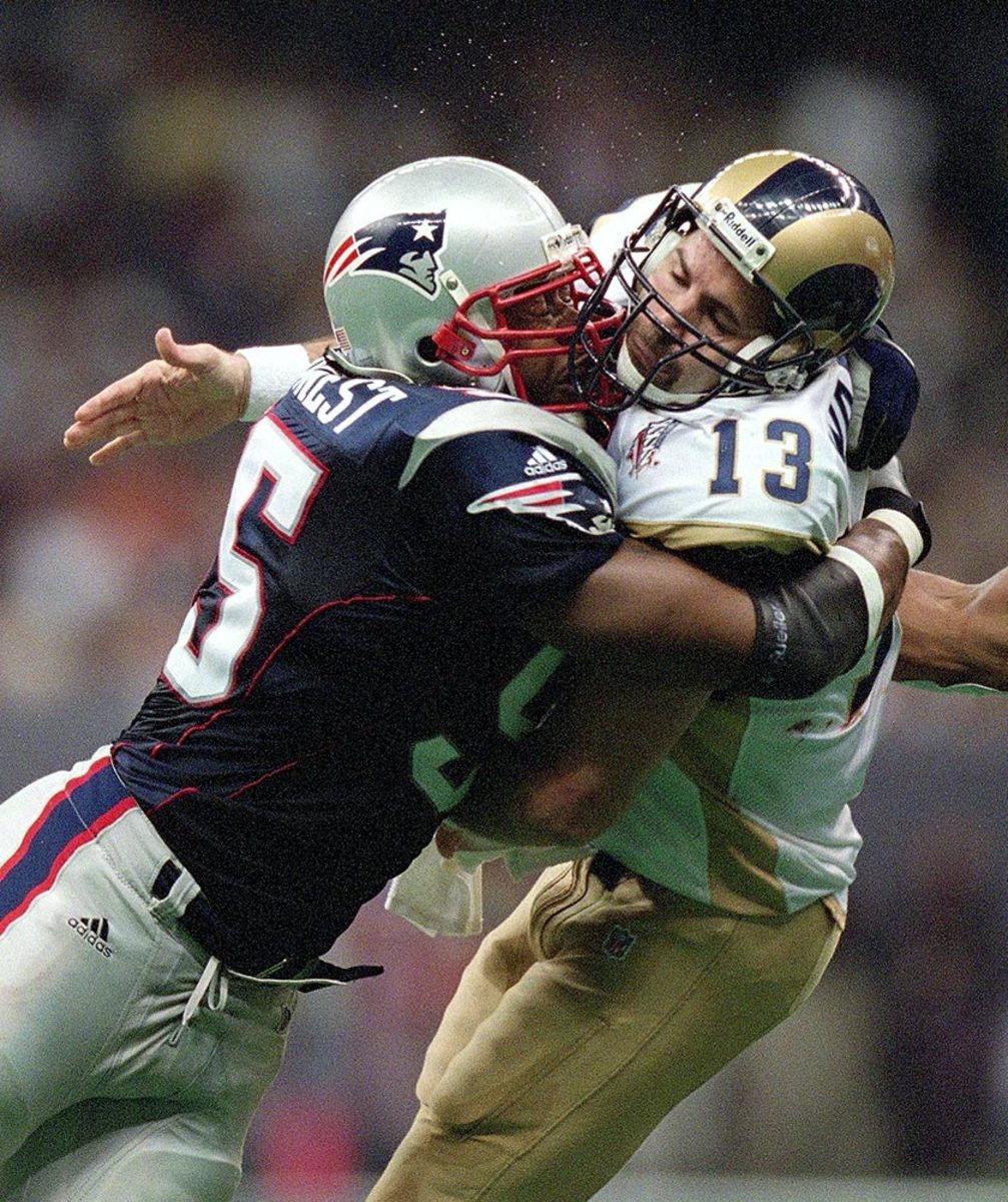 2002-0203-Super-Bowl-XXXVI-Willie-McGinest-Kurt-Warner-001280494r.jpg