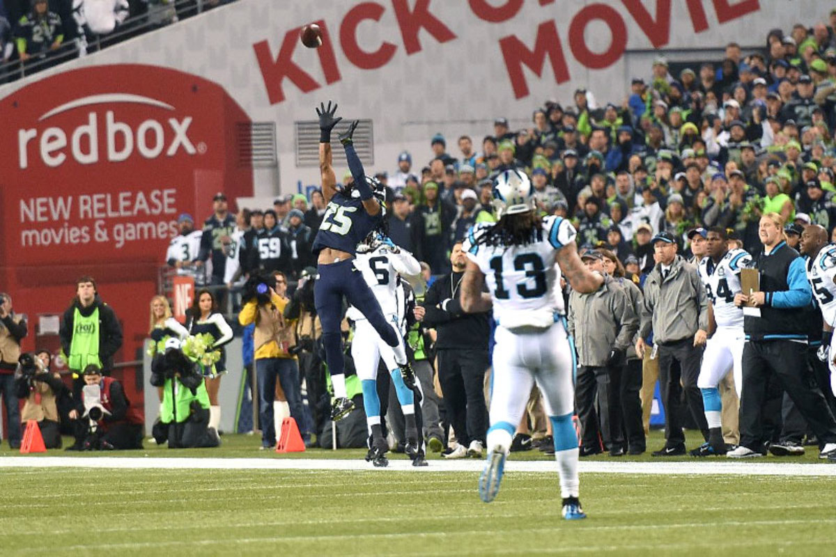 Sherman got his first postseason pick against the Panthers. (Robert Beck/Sports Illustrated/The MMQB)