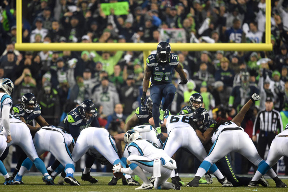 Kam Chancellor goes up and over against the Panthers. (Rod Mar for Sports Illustrated/The MMQB)