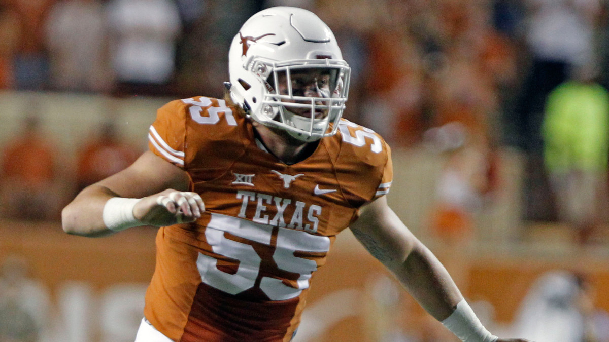 Texas LB Dalton Santos suffers ankle injury Sports Illustrated
