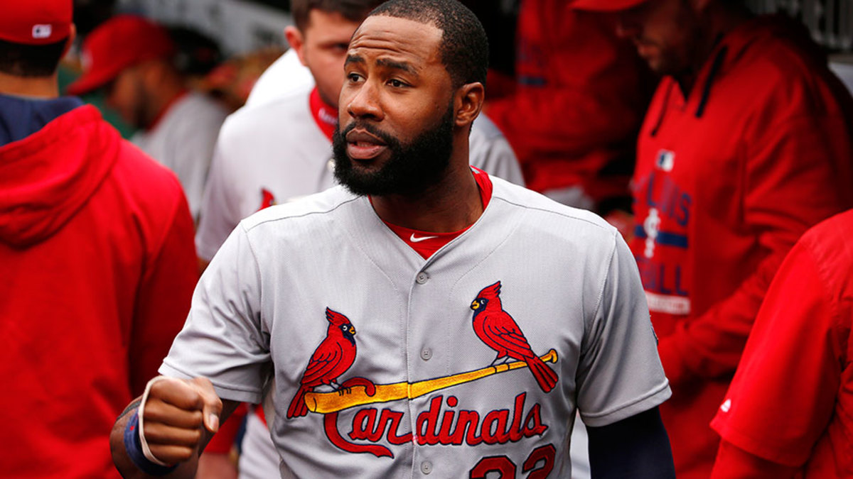 Chicago Cubs Jason Heyward scores in front of St. Louis Cardinals