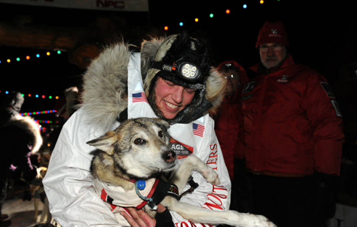 Zirkle with her lead dog after finishing in second place behind race winner Dallas Seavey in the 2014 Iditarod.
