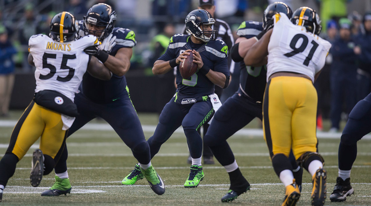 On his 27th birthday, Russell Wilson threw for 345 yards and five touchdowns.